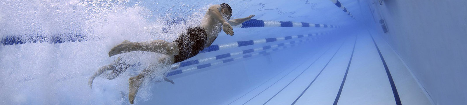 Underwater photo of person in a swimming pool.