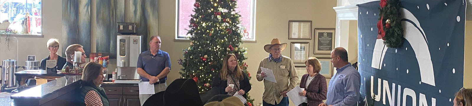 Photo of customers inside a bank lobby during a holiday open house.